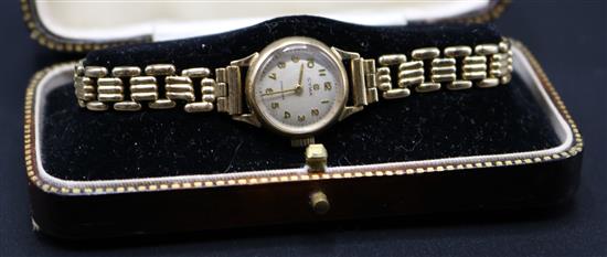 Cyma 9ct gold ladies watch on gold plated bracelet strap